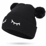 Closed eyes pom-pom beanie